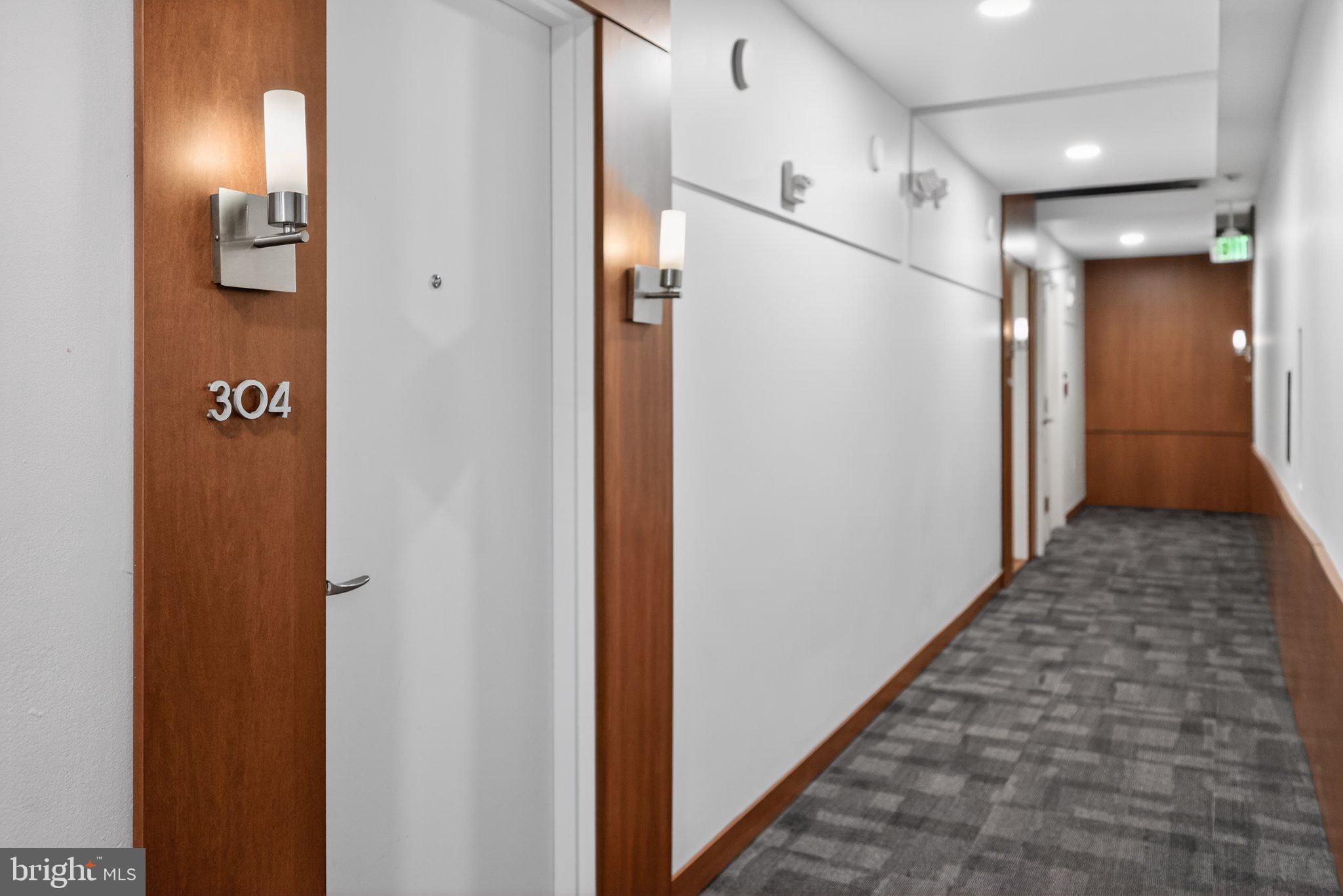 2010 Kalorama Road Northwest, Unit 304 Washington, DC 20009 - Photo 3 of 23 a view of a hallway with a elevator