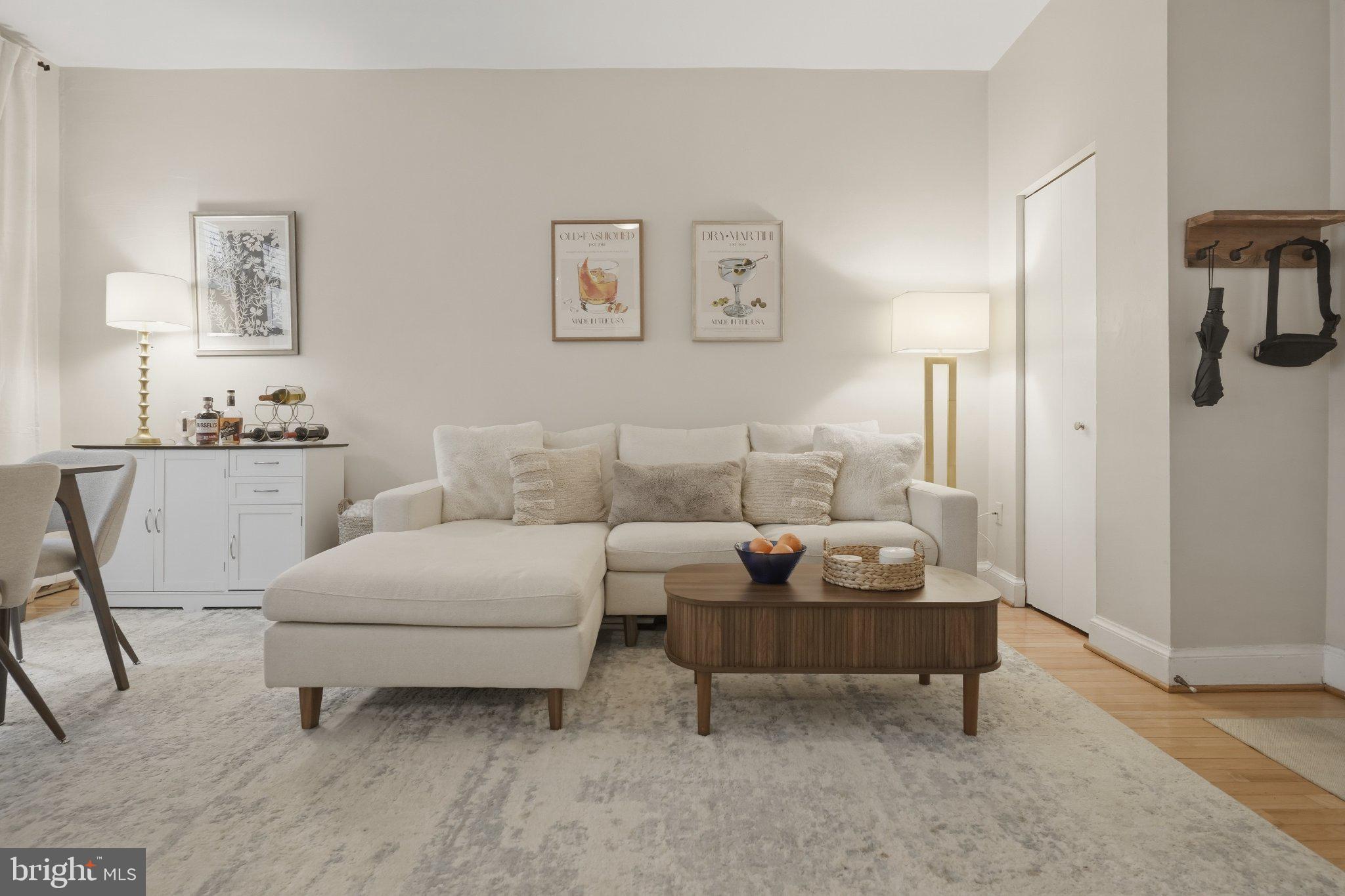 2010 Kalorama Road Northwest, Unit 304 Washington, DC 20009 - Photo 5 of 23 a living room with furniture and a window