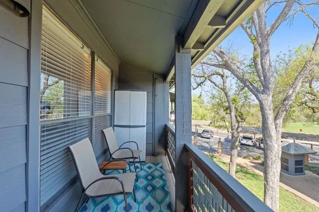 a bathroom with a sink toilet vanity and shower