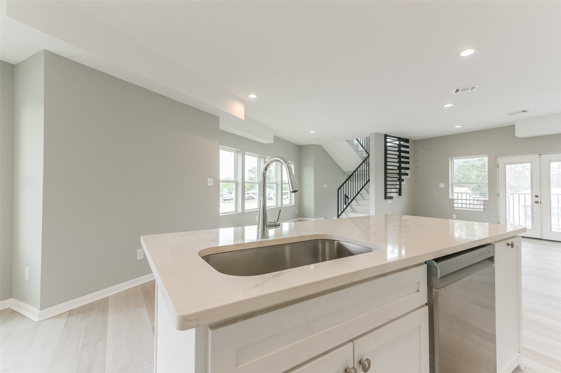 5302 Tarawa Road Houston, TX 77033 - Photo 16 of 35 Quartz countertops and a generous sized kitchen island.