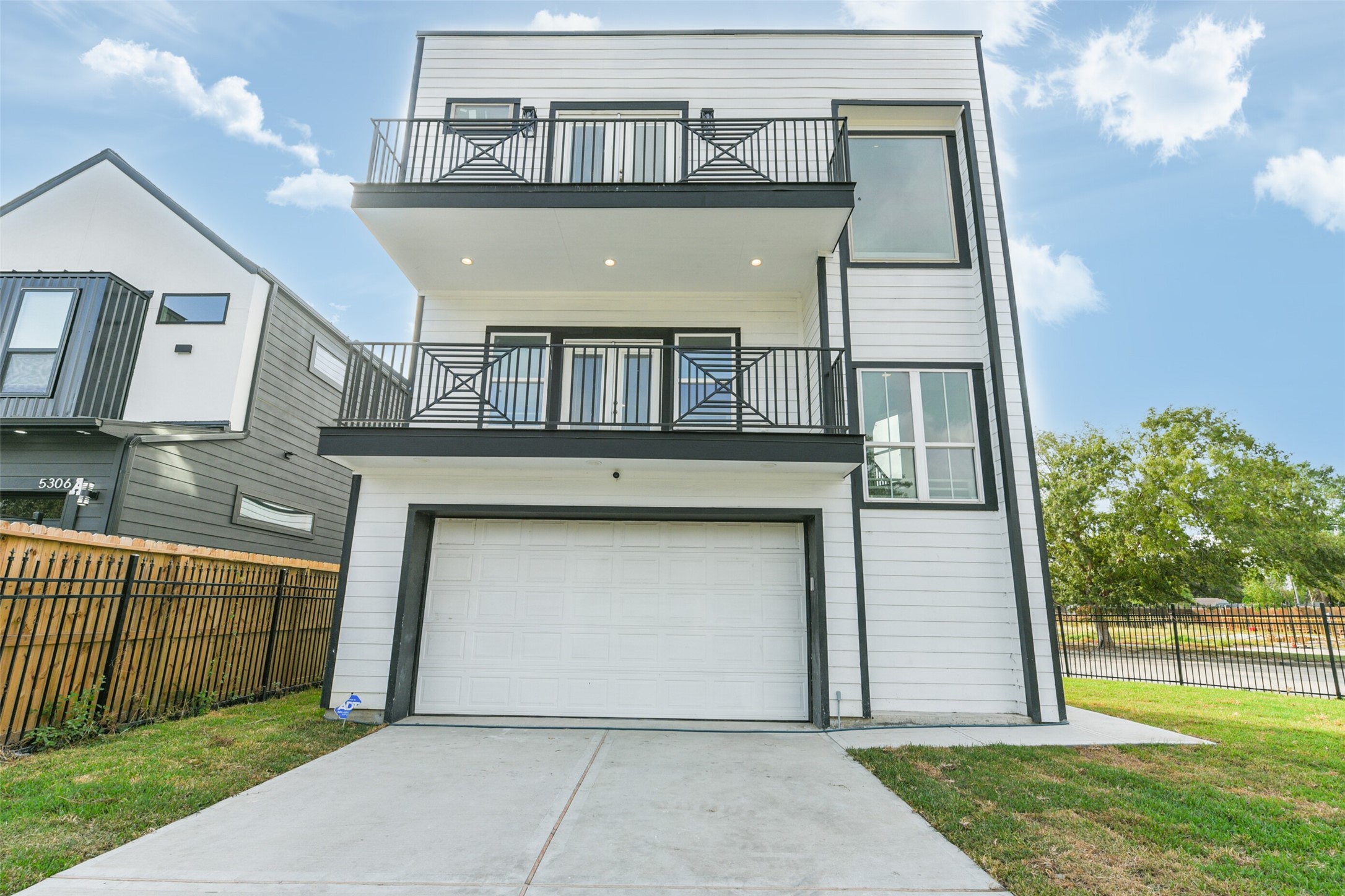 5302 Tarawa Road Houston, TX 77033 - Photo 2 of 35 Townhome has two balcones and the driveway also has a private gate.