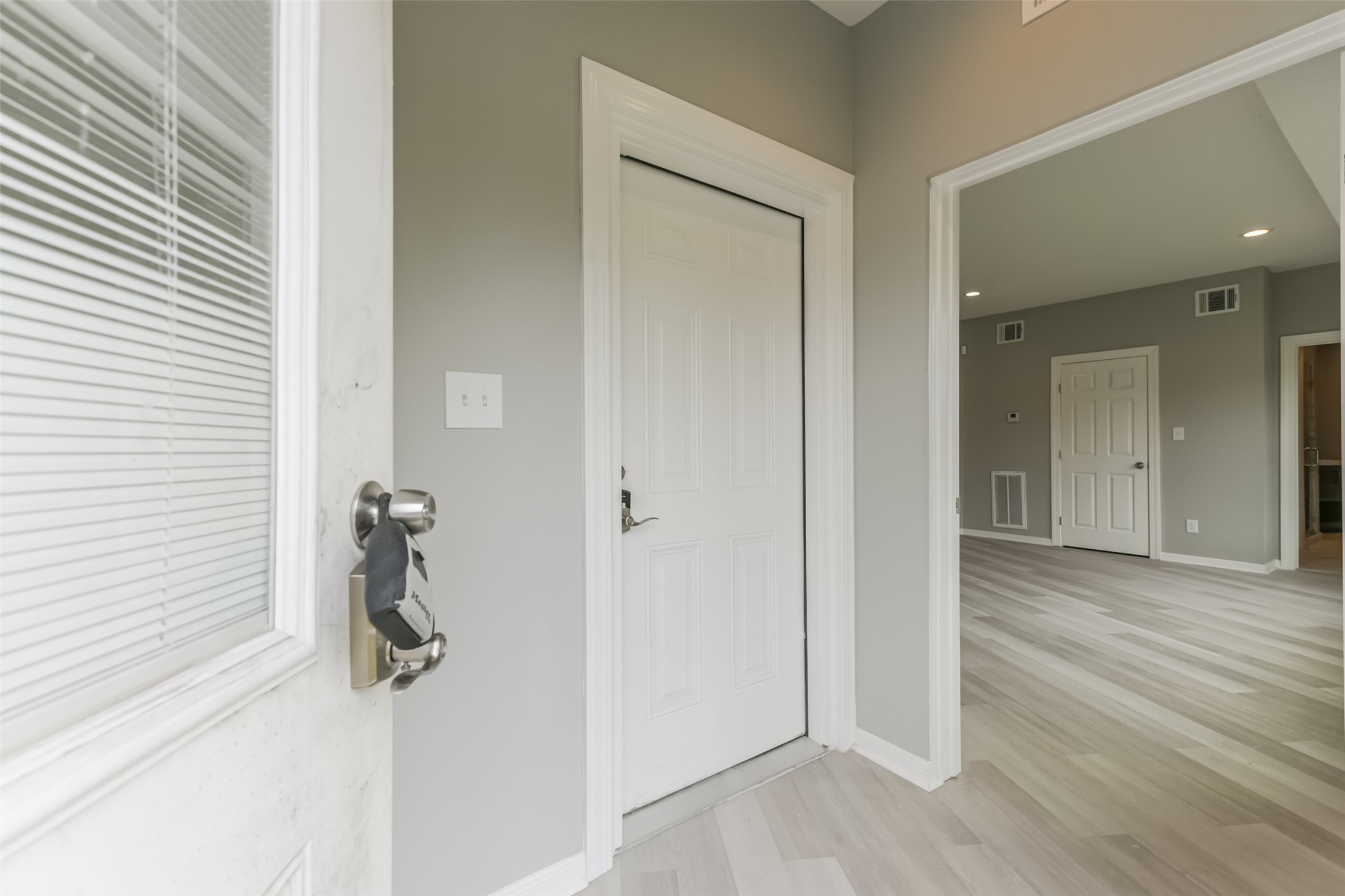 5302 Tarawa Road Houston, TX 77033 - Photo 4 of 35 Downstairs find a two car garage, and one bedroom and a full bath.