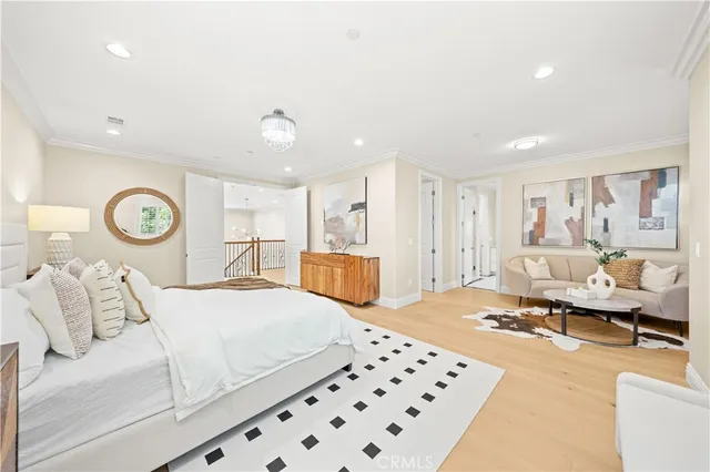a spacious bathroom with a double vanity sink mirror and toilet