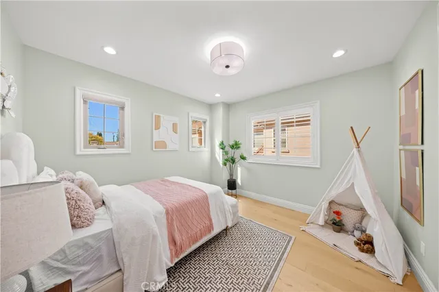 an aerial view of a house with a lake view