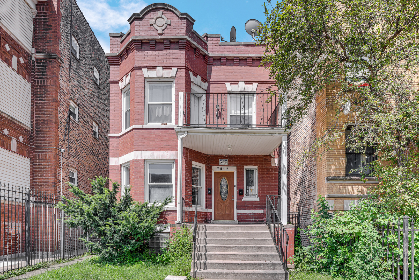 7012 South Sangamon Street Chicago, IL 60621 - Photo 1 of 8 Gallery Image 1