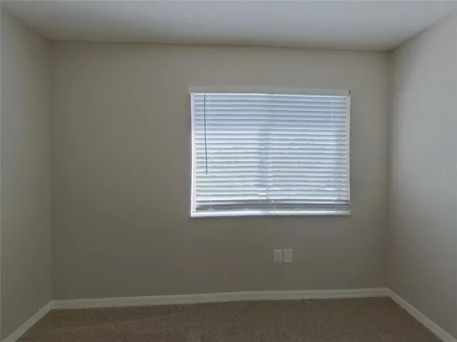 a view of a small space with a window