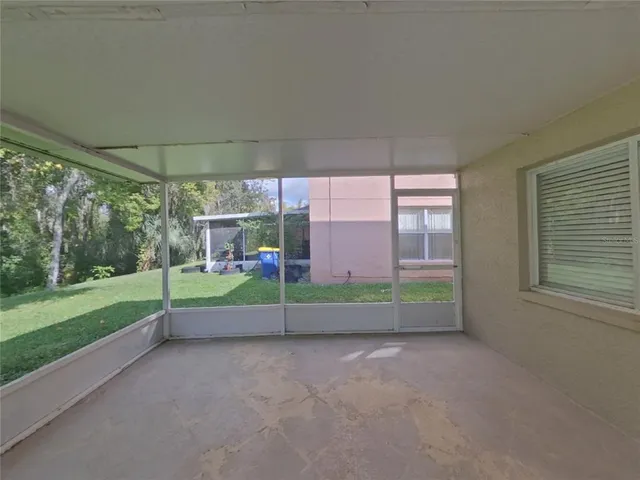 a view of backyard with green space