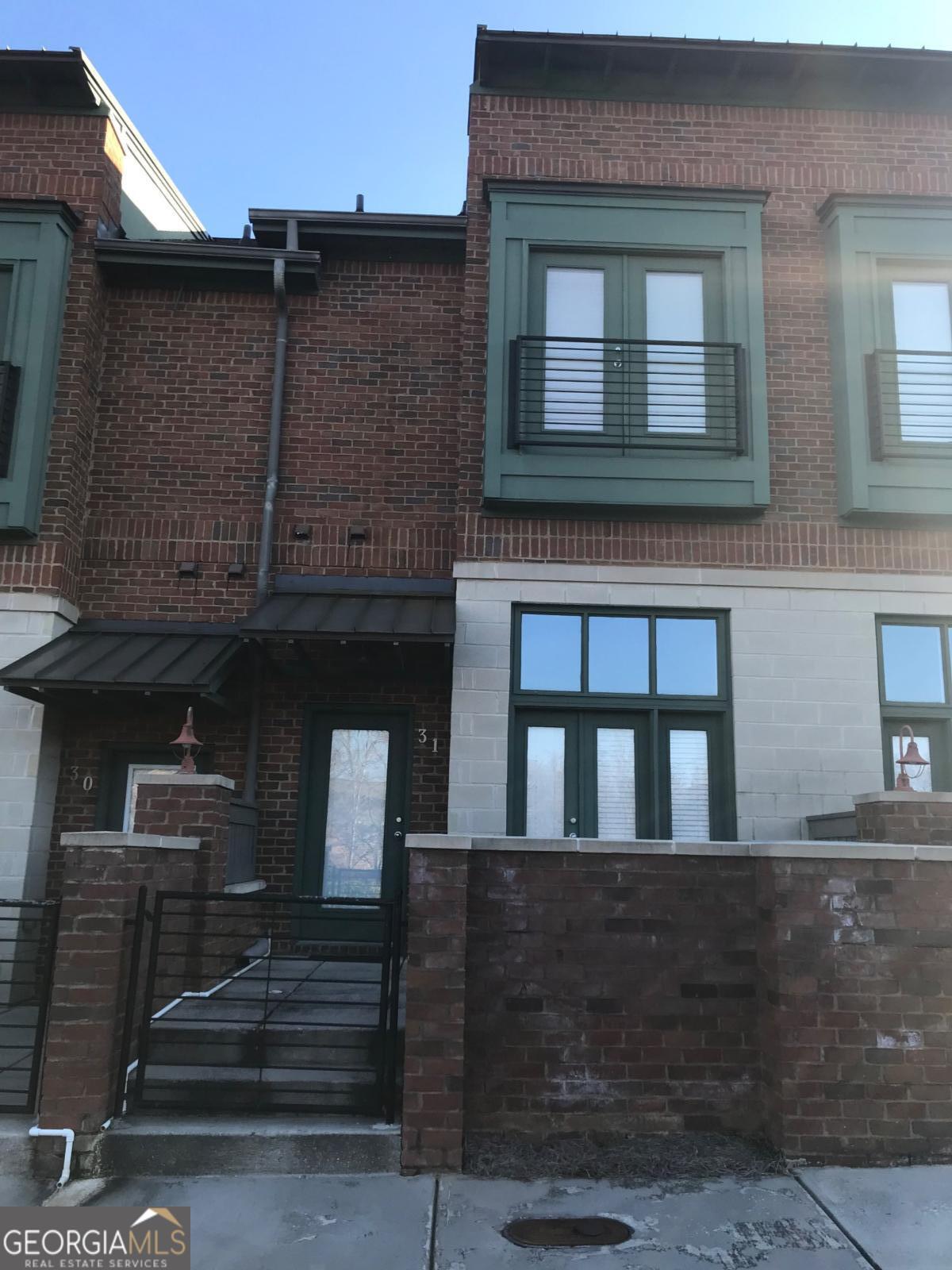 1500 Timothy Road, Unit D31 Athens, GA 30606 - Photo 2 of 19 a front view of a house