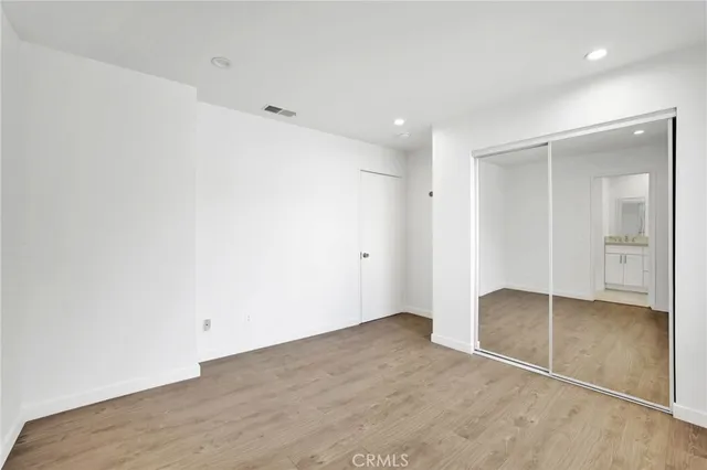 an empty room with mirror