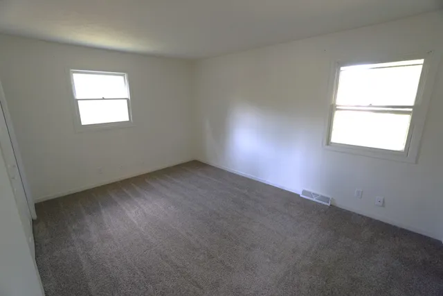 an empty room with a window