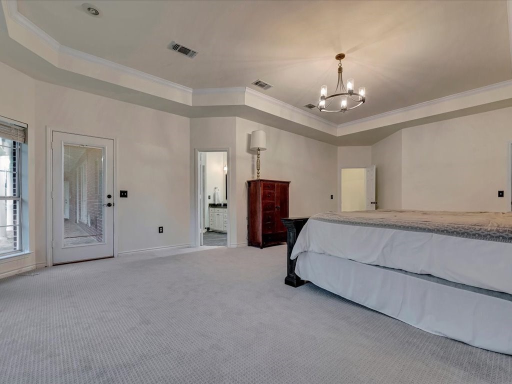 206 Cascade Court Lufkin, TX 75901 - Photo 17 of 27 a spacious bedroom with furniture and window