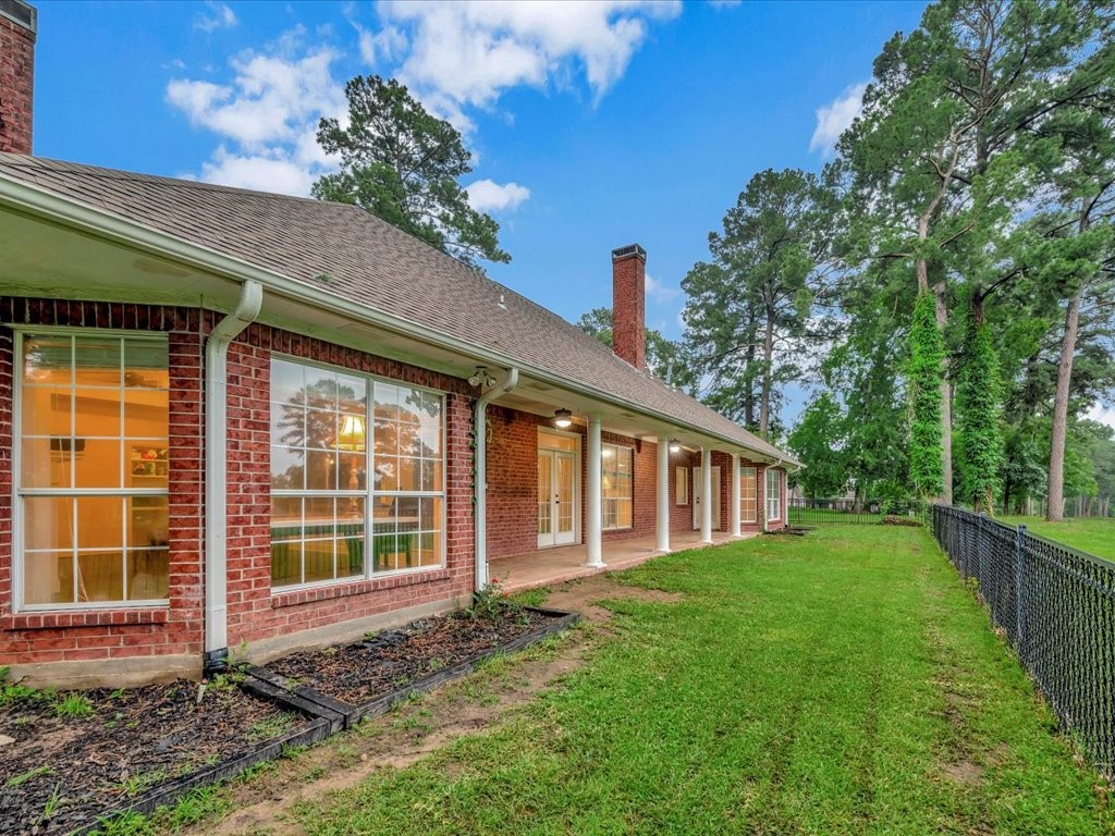 206 Cascade Court Lufkin, TX 75901 - Photo 23 of 27 a view of a house with a yard