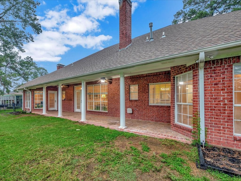 206 Cascade Court Lufkin, TX 75901 - Photo 25 of 27 a view of a house with a yard and sitting area