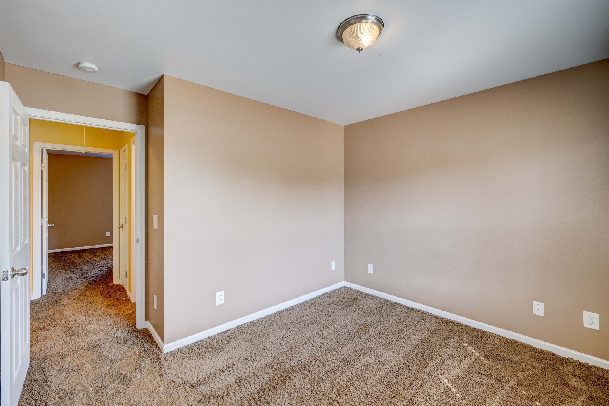 582 Cedar Grove Road Lebanon, TN 37087 - Photo 29 of 47 an empty room with closet and a bathroom
