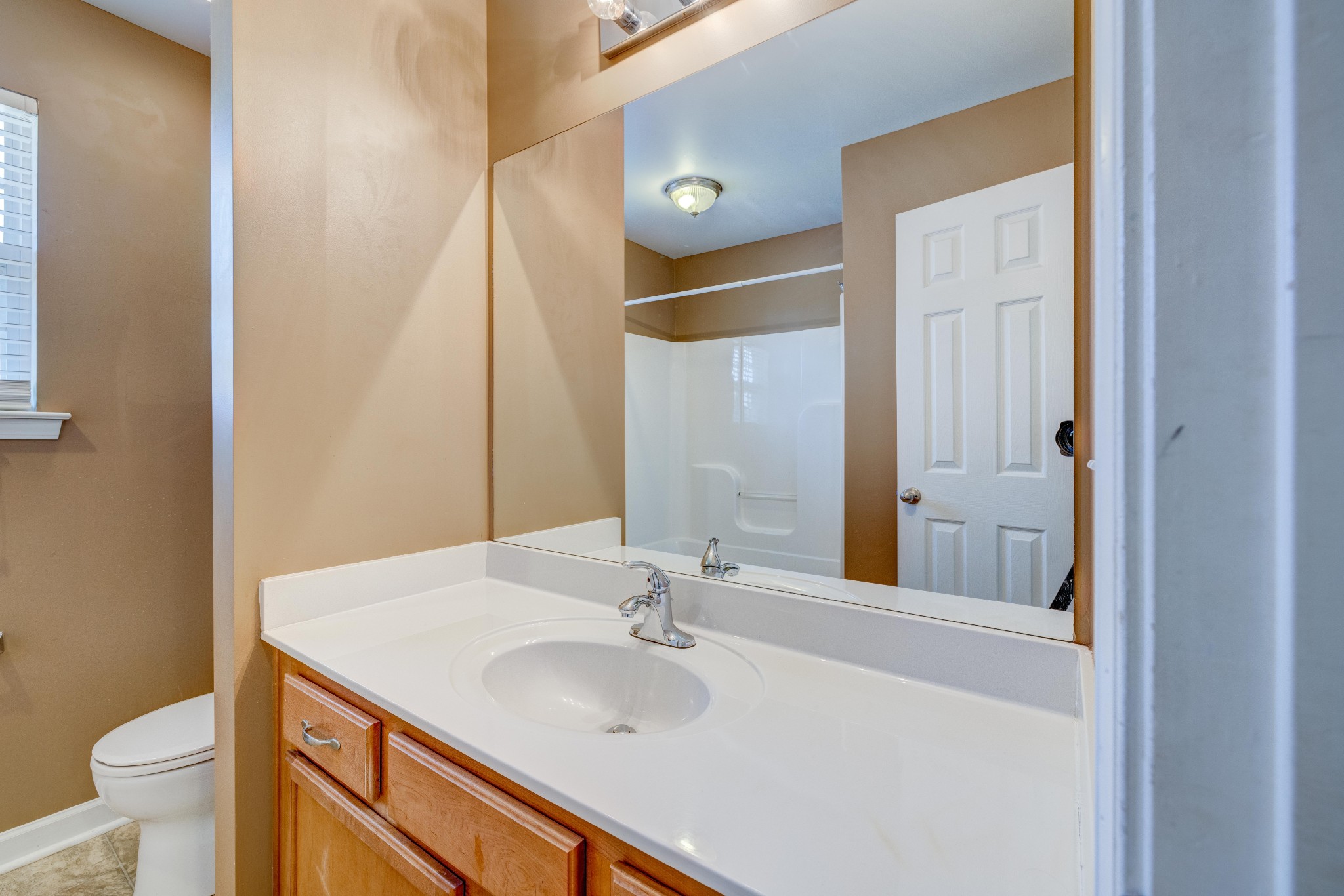 582 Cedar Grove Road Lebanon, TN 37087 - Photo 30 of 47 a bathroom with a sink and a mirror