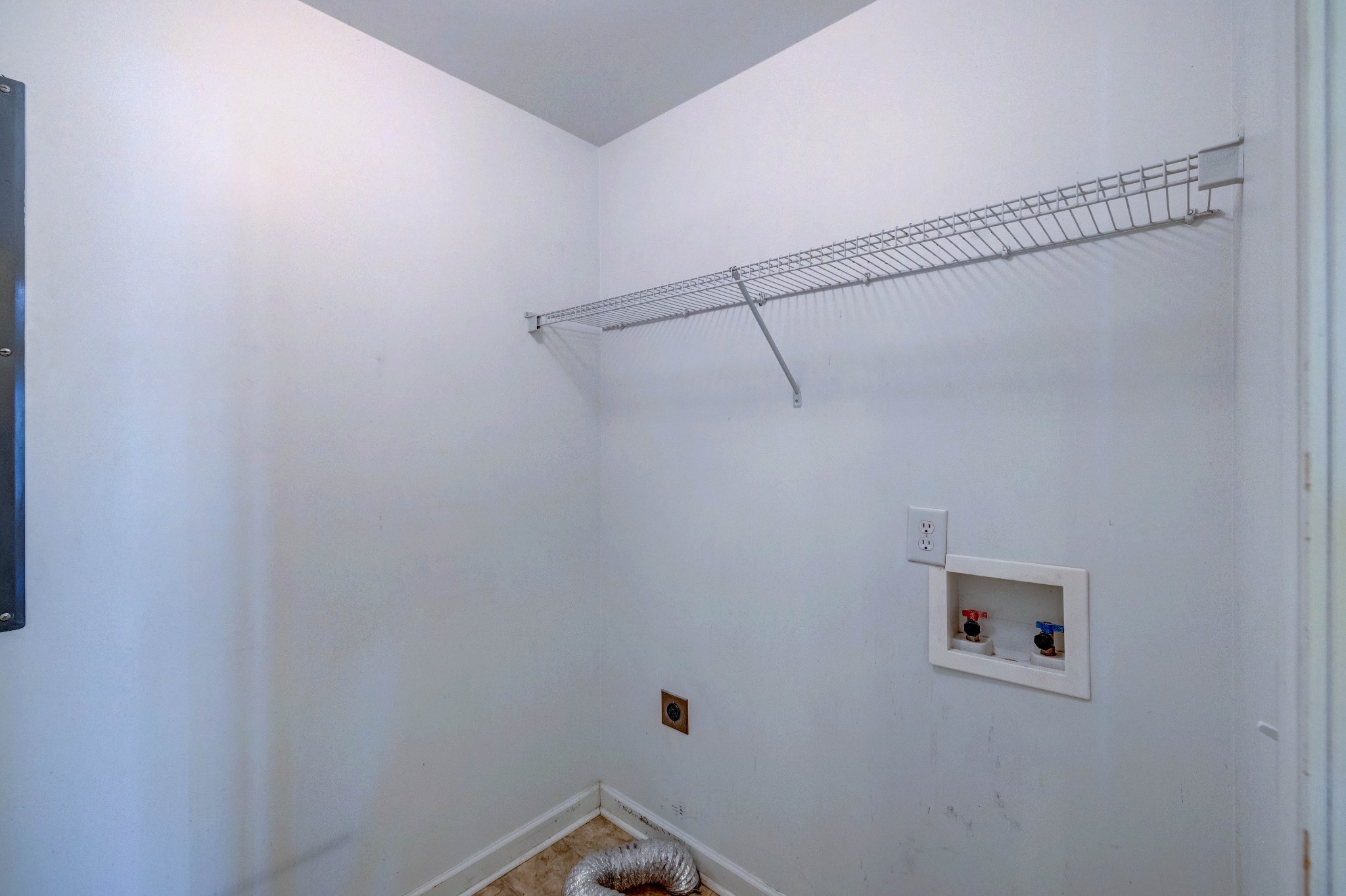 582 Cedar Grove Road Lebanon, TN 37087 - Photo 32 of 47 a view of a room with racks on the wall