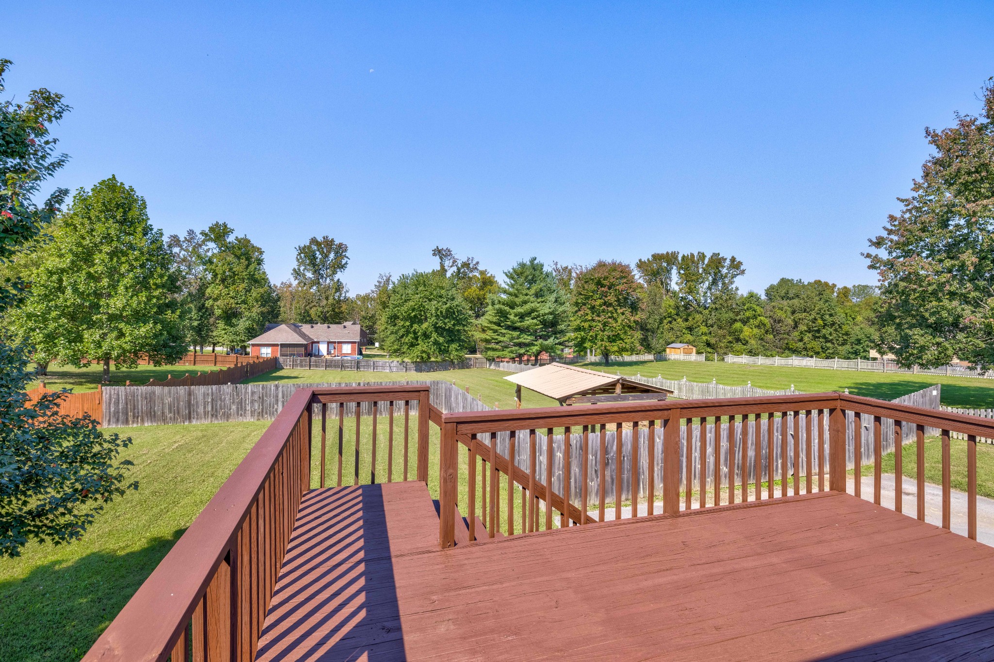 582 Cedar Grove Road Lebanon, TN 37087 - Photo 42 of 47 a balcony with wooden floor in front of yard