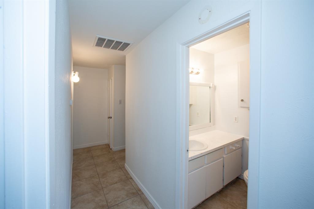 13552 Waterfall Way Dallas, TX 75240 - Photo 14 of 27 Hall heading to master