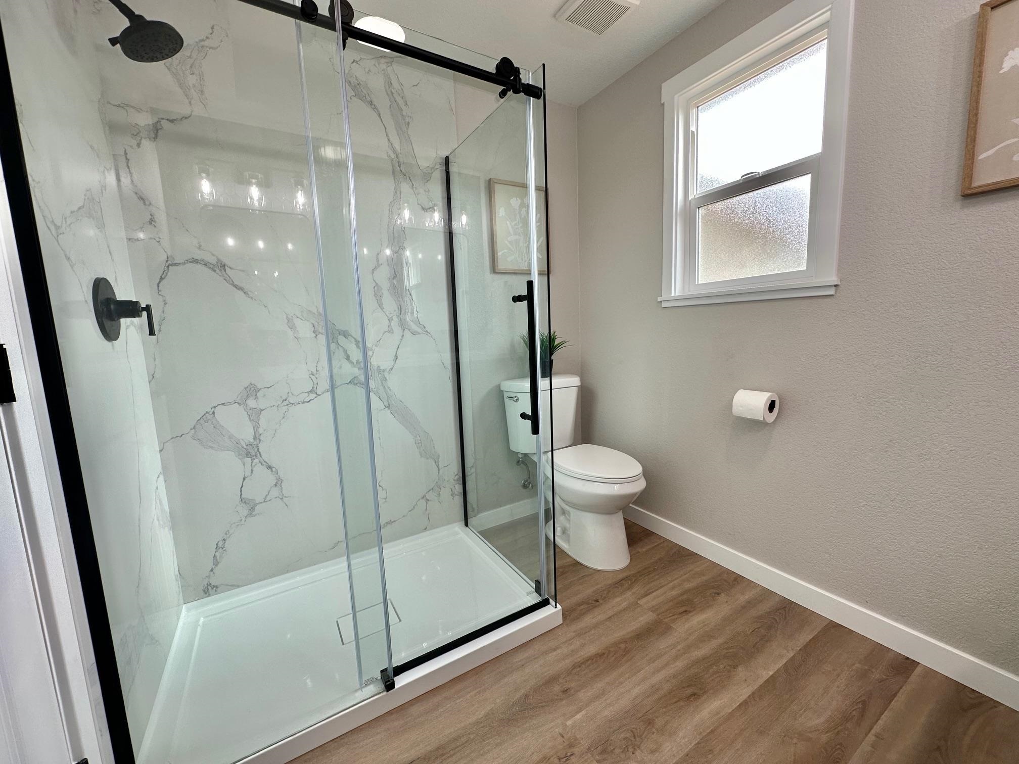225 Kent Place San Ramon, CA 94583 - Photo 14 of 32 a bathroom with a toilet and a shower