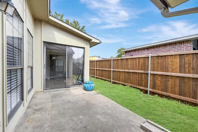 a view of a backyard with a garden
