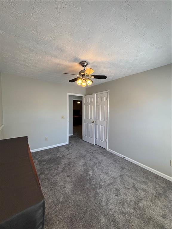 4949 Penscot Way Stone Mountain, GA 30088 - Photo 20 of 40 a view of livingroom with window