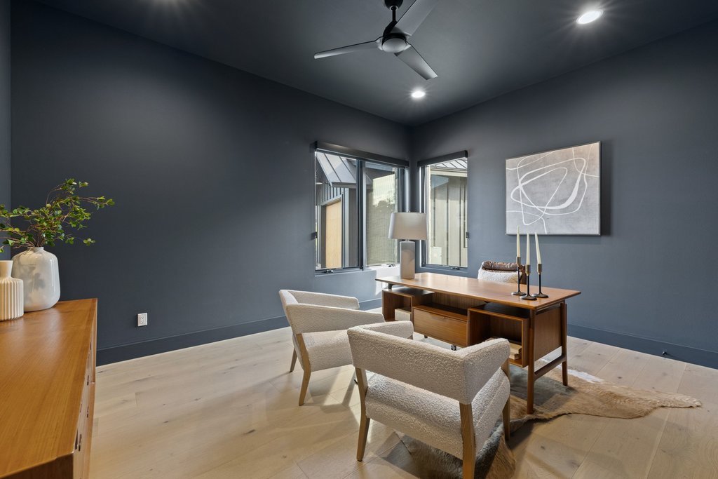 6316 Caudill Lane Austin, TX 78738 - Photo 18 of 40 a living room with furniture and a potted plant