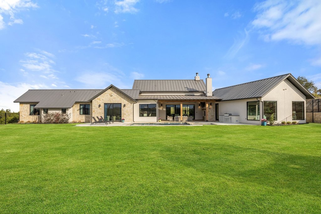 6316 Caudill Lane Austin, TX 78738 - Photo 31 of 40 a front view of house with yard and green space