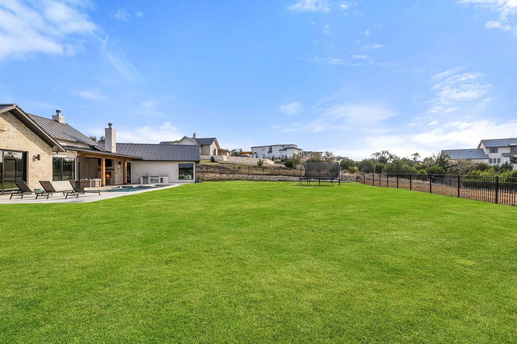 6316 Caudill Lane Austin, TX 78738 - Photo 32 of 40 a front view of house with yard and trees