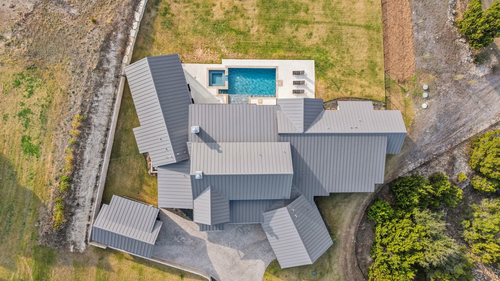 6316 Caudill Lane Austin, TX 78738 - Photo 33 of 40 an aerial view of a house with a yard