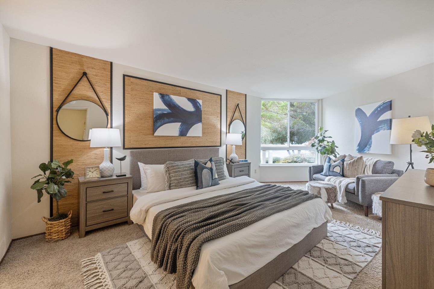 320 Vallejo Drive, Unit 23 Millbrae, CA 94030 - Photo 16 of 50 a bedroom with a bed and a painting on the wall