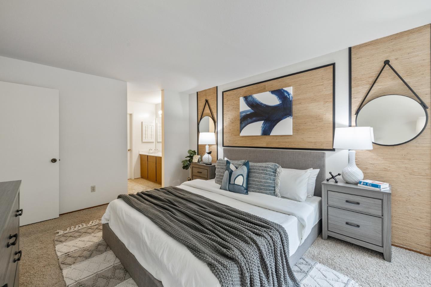 320 Vallejo Drive, Unit 23 Millbrae, CA 94030 - Photo 18 of 50 a bedroom with a bed and a painting on the wall