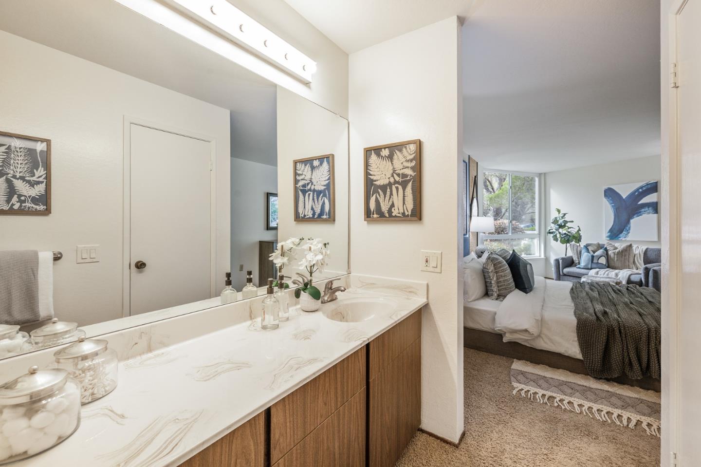 320 Vallejo Drive, Unit 23 Millbrae, CA 94030 - Photo 20 of 50 a spacious bathroom with a double vanity sink and a mirror