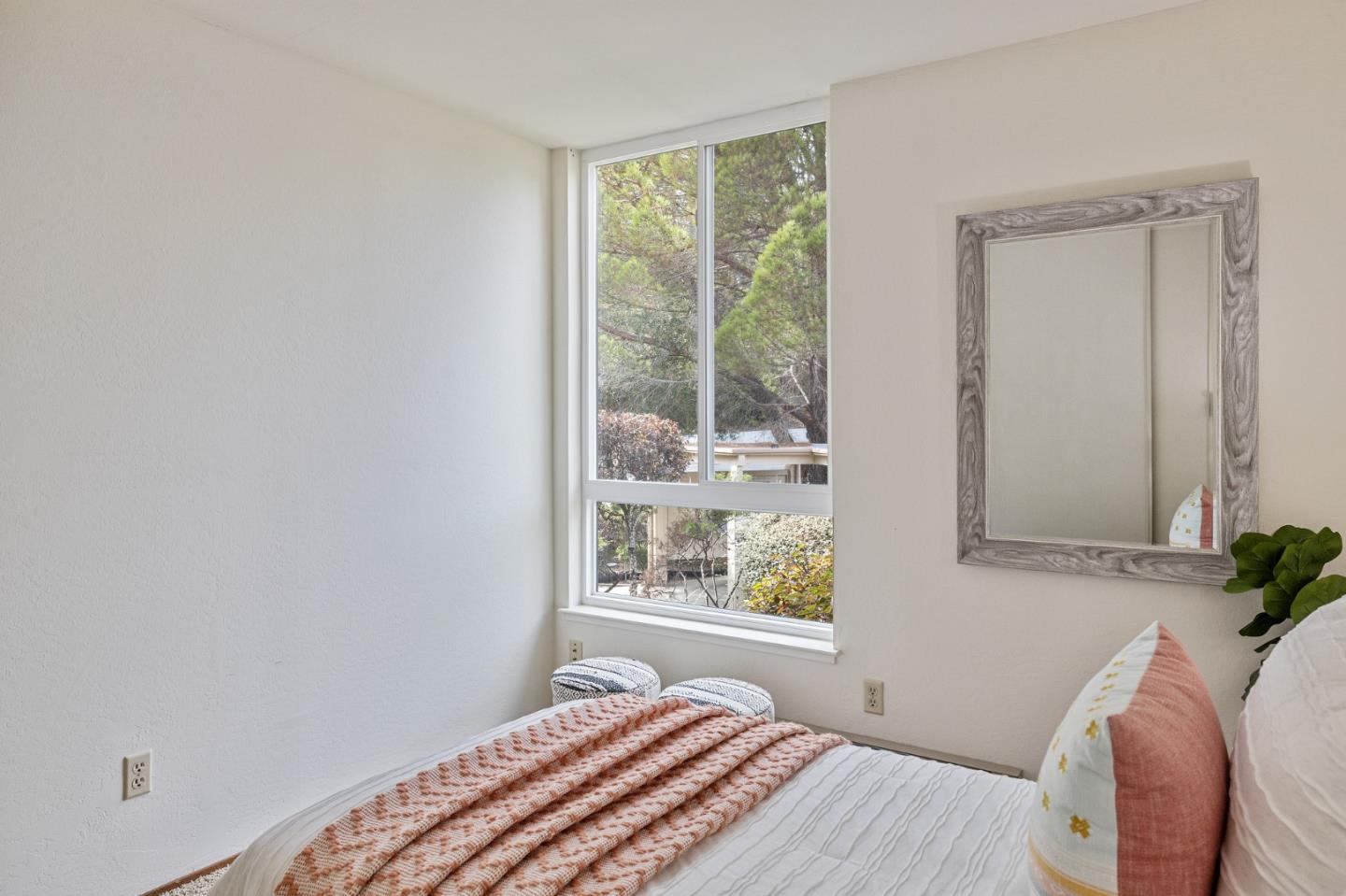 320 Vallejo Drive, Unit 23 Millbrae, CA 94030 - Photo 24 of 50 a bedroom with a bed and a window