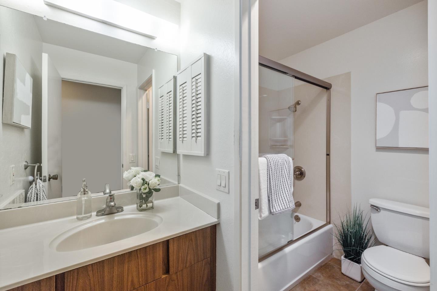 320 Vallejo Drive, Unit 23 Millbrae, CA 94030 - Photo 25 of 50 a bathroom with a sink a toilet and shower