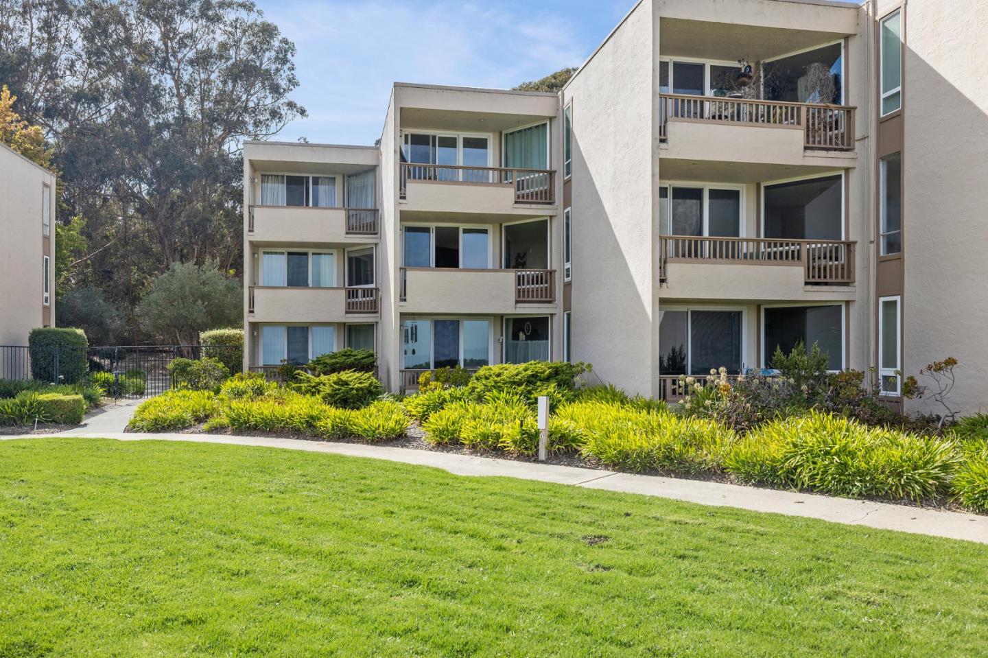 320 Vallejo Drive, Unit 23 Millbrae, CA 94030 - Photo 30 of 50 a front view of a house with a yard