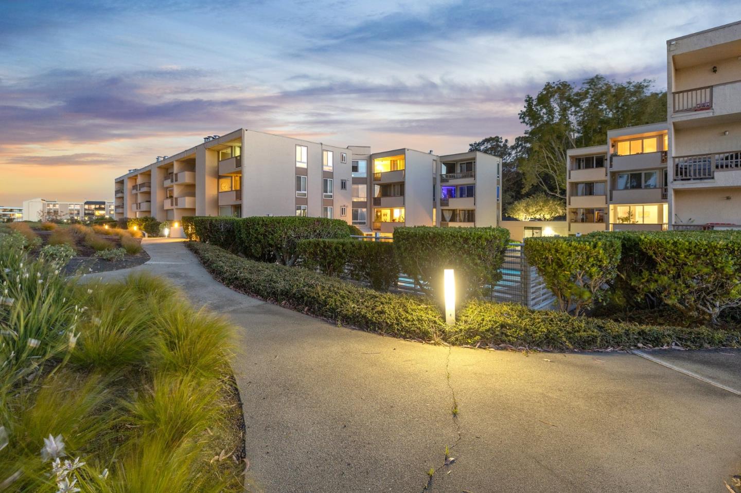 320 Vallejo Drive, Unit 23 Millbrae, CA 94030 - Photo 47 of 50 a view of swimming pool in front of residential houses