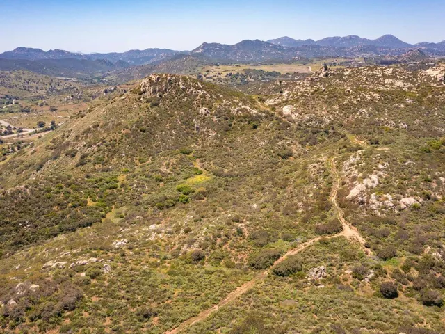 a view of ocean and mountain