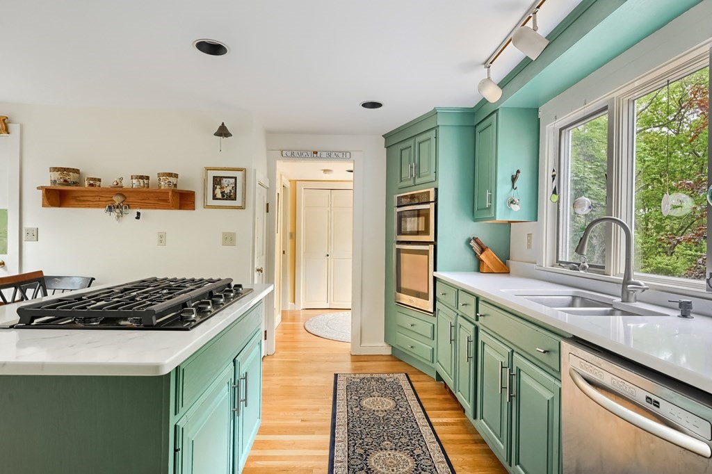 214 Park Avenue Barnstable, MA 02632 - Photo 13 of 42 a kitchen that has a sink and a stove