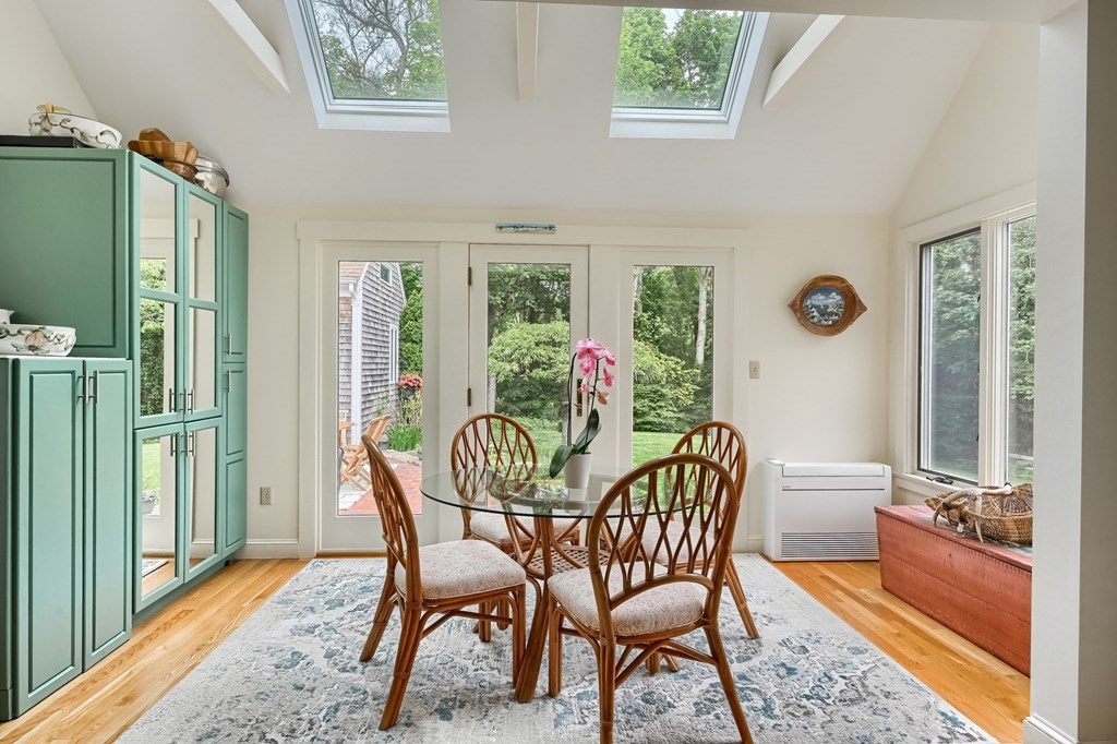 214 Park Avenue Barnstable, MA 02632 - Photo 22 of 42 a view of a dining room with furniture window and wooden floor