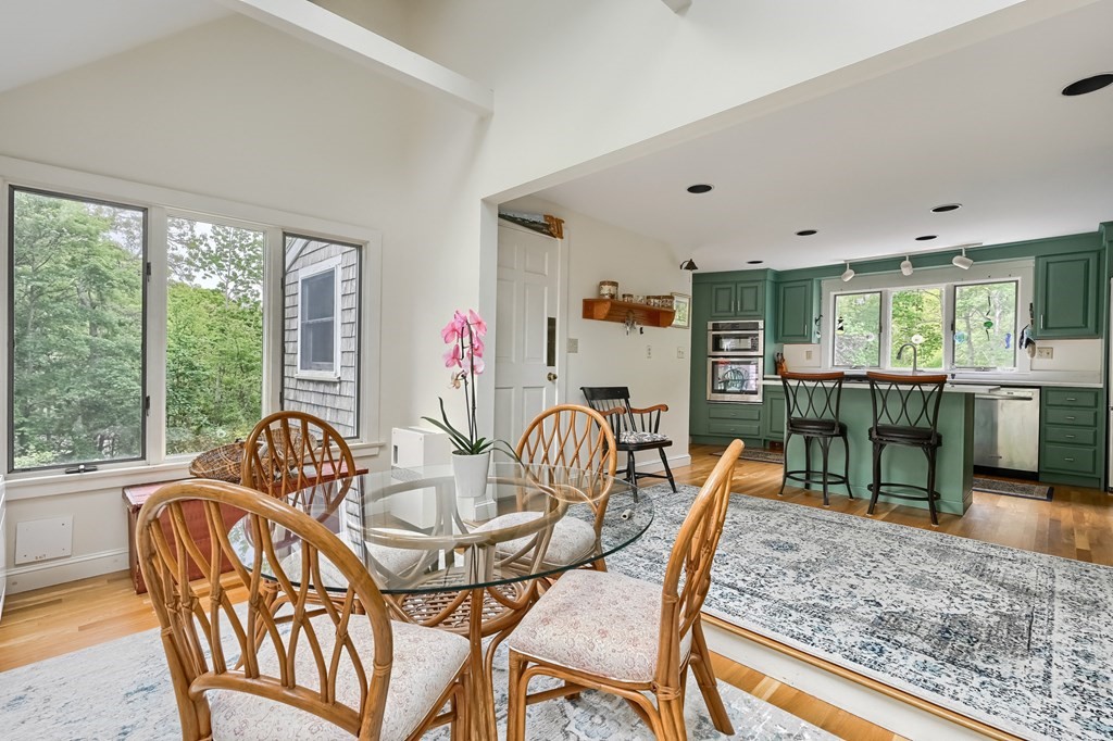214 Park Avenue Barnstable, MA 02632 - Photo 23 of 42 a dining room with furniture and wooden floor