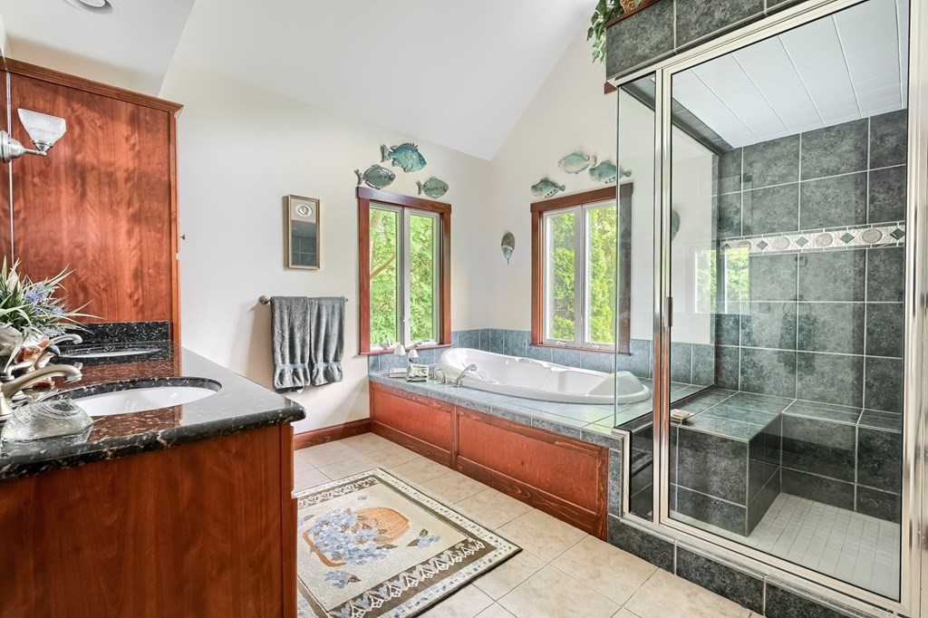 214 Park Avenue Barnstable, MA 02632 - Photo 28 of 42 a bathroom with a granite countertop sink and a mirror