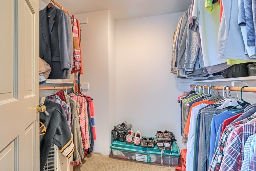 214 Park Avenue Barnstable, MA 02632 - Photo 40 of 42 a view of walk in closet with clothes and shoes