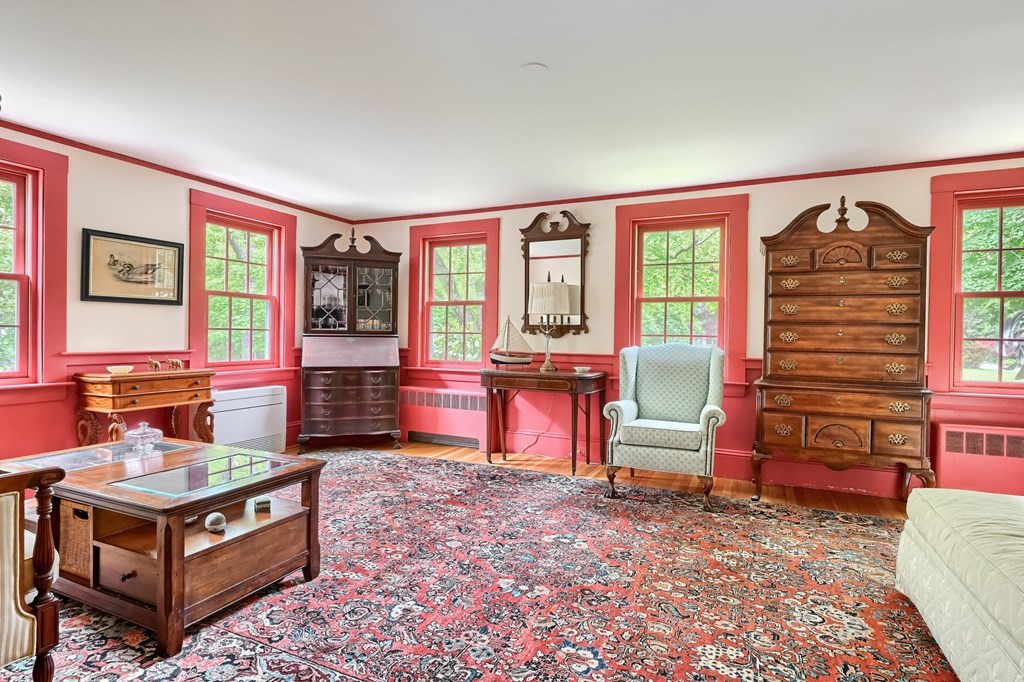 214 Park Avenue Barnstable, MA 02632 - Photo 8 of 42 a living room with furniture a flat screen tv and a refrigerator