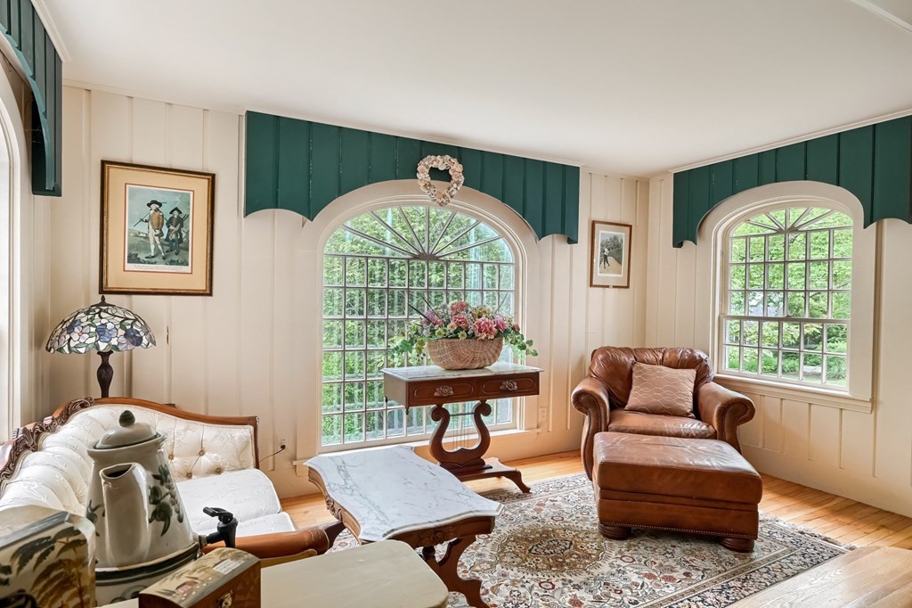 214 Park Avenue Barnstable, MA 02632 - Photo 9 of 42 a living room with furniture a table and a large window