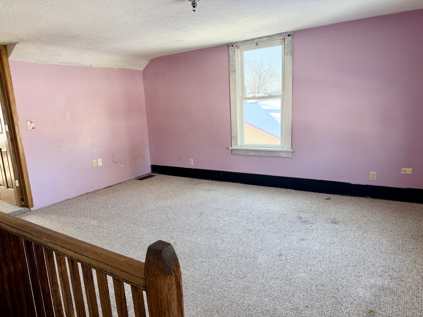 1429 Phelps Street Ottawa, IL 61350 - Photo 23 of 27 a view of an empty room with a window