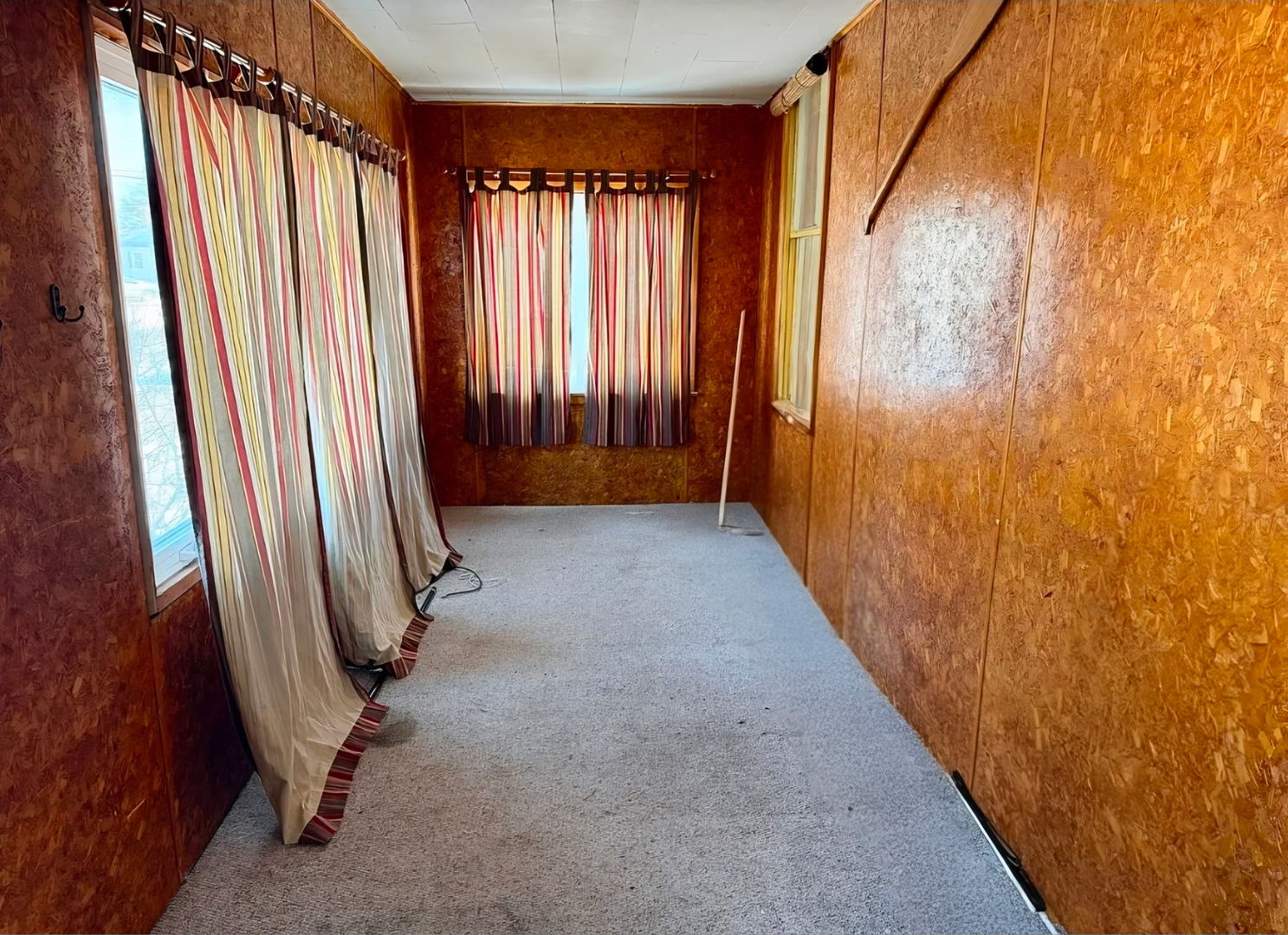 1429 Phelps Street Ottawa, IL 61350 - Photo 24 of 27 wooden floor in an empty room with a window
