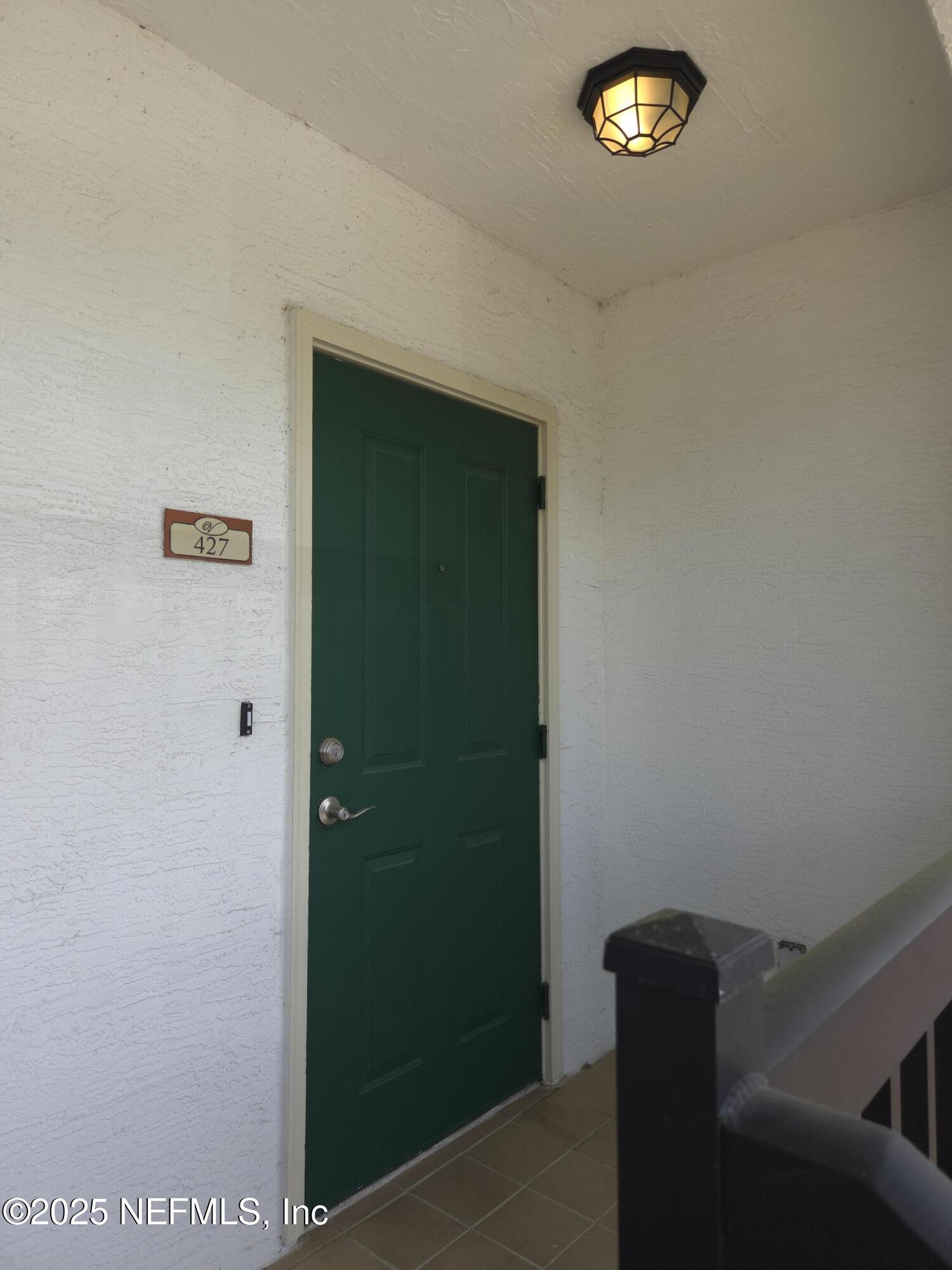 9745 Touchton Road, Unit 427 Jacksonville, FL 32246 - Photo 3 of 52 a view of a hallway