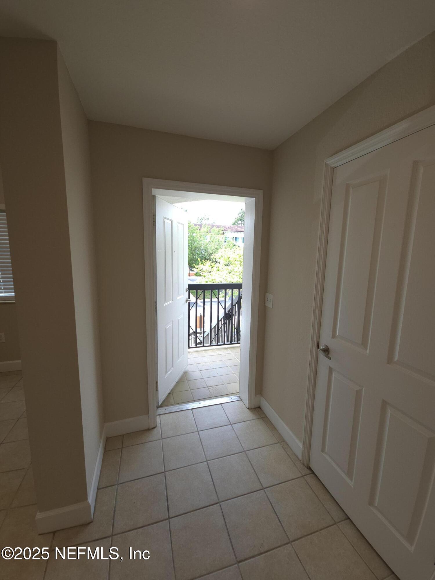 9745 Touchton Road, Unit 427 Jacksonville, FL 32246 - Photo 4 of 52 a view of hallway with windows