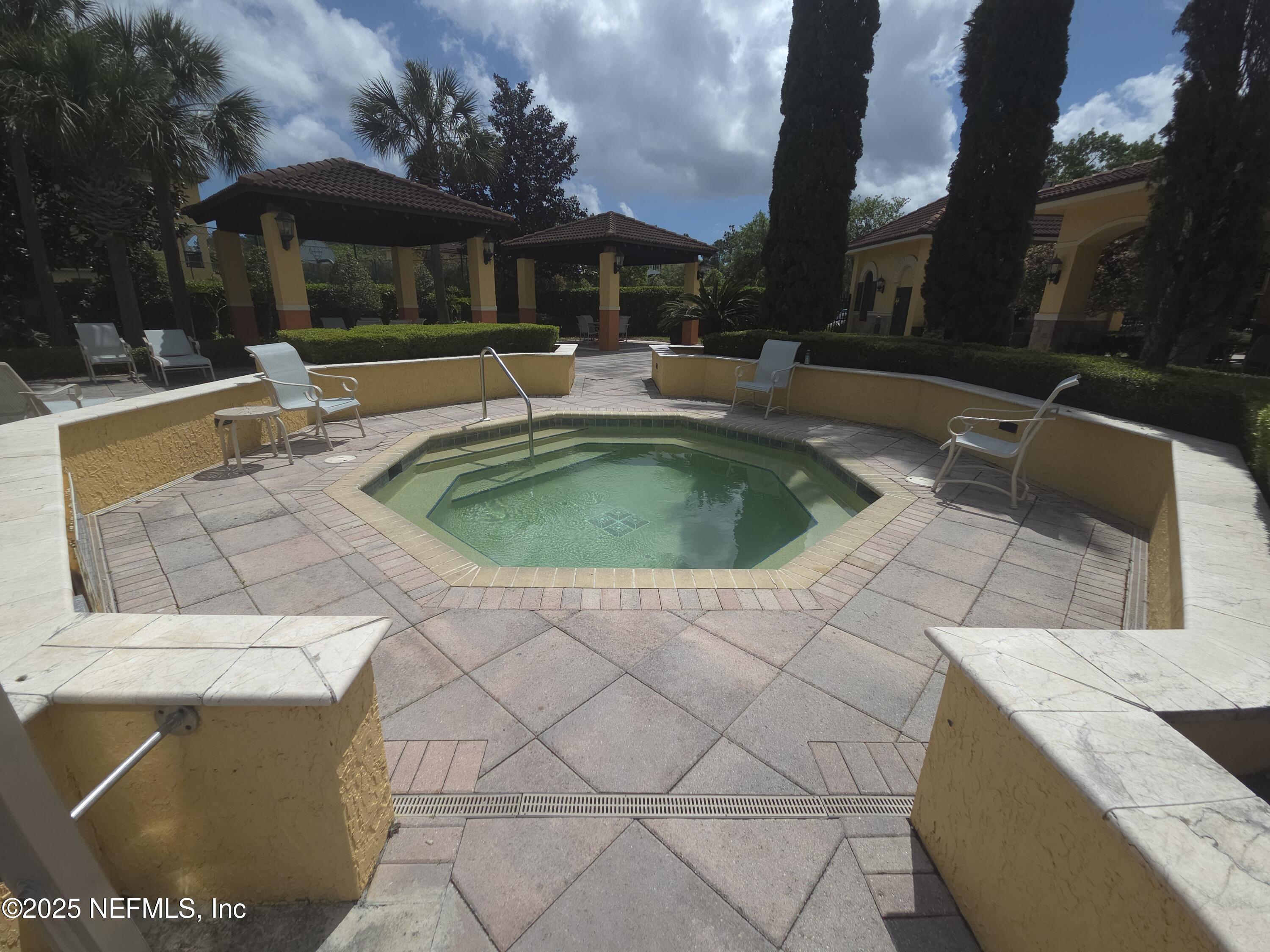 9745 Touchton Road, Unit 427 Jacksonville, FL 32246 - Photo 49 of 52 a house view with a outdoor space