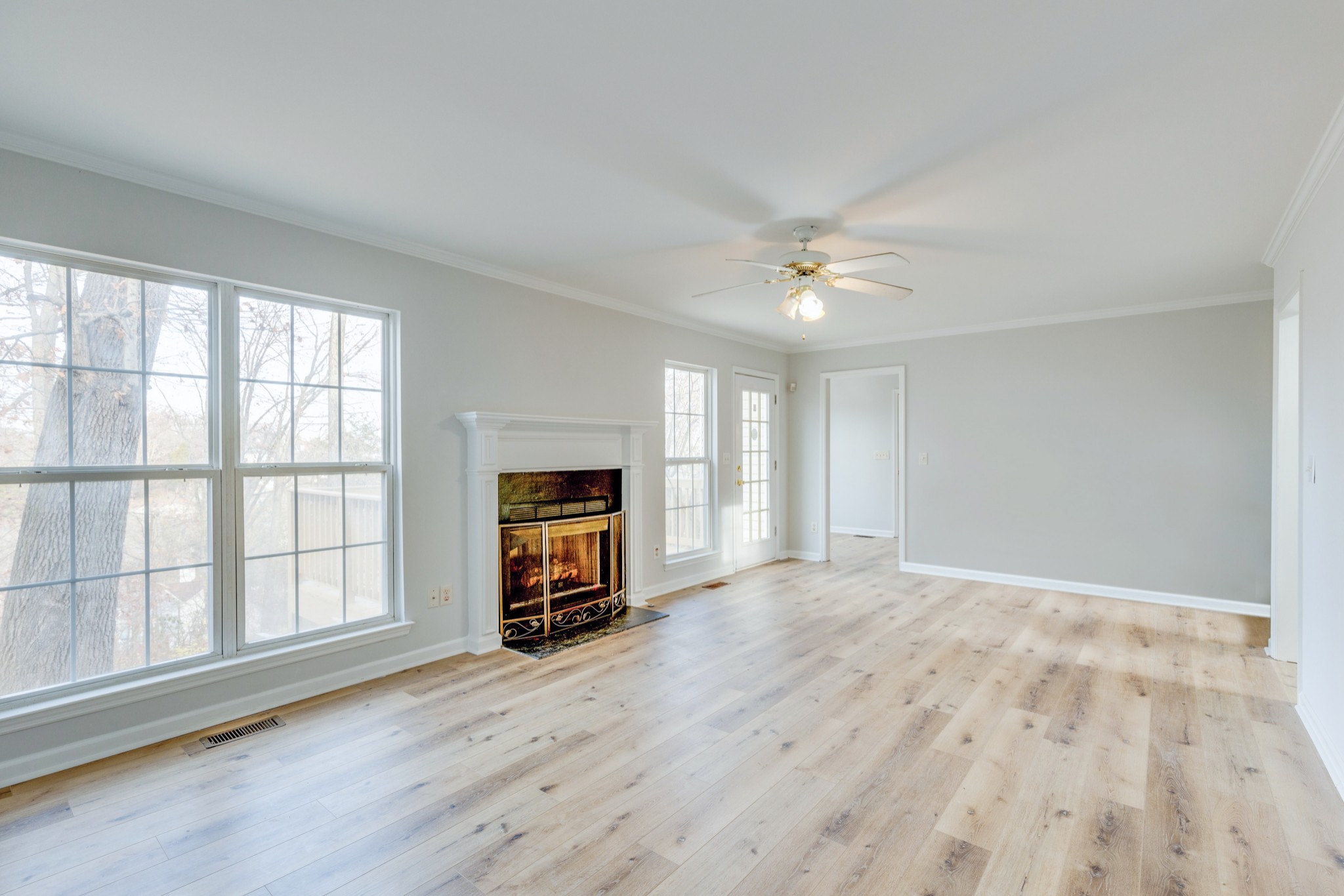 2829 Rader Ridge Court Antioch, TN 37013 - Photo 12 of 35 wooden floor in an empty room with a window